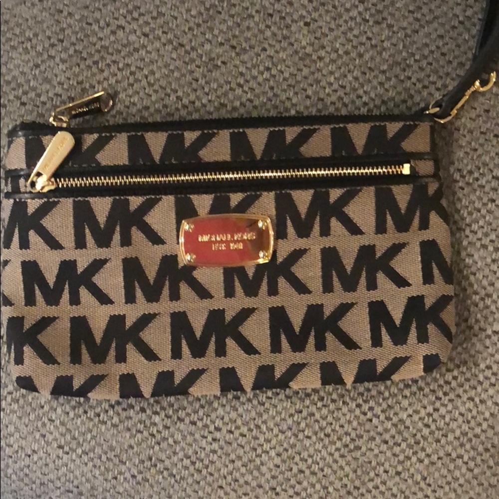 Michael Kors wristlet. Never used, brand new